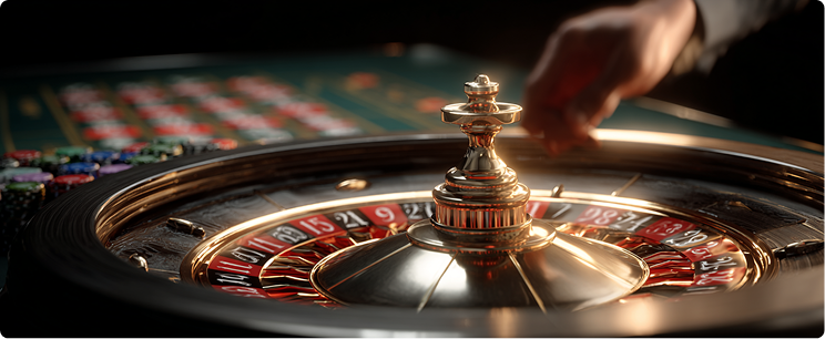 Distinctive American Roulette wheel featuring double-zero green pocket, alternating red and black numbers, polished wooden frame, and silver ball in motion around the track